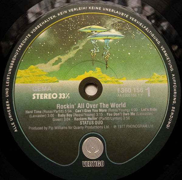 Status Quo : Rockin' All Over The World (LP, Album, Bla)